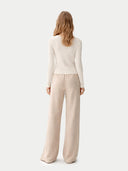 Women's Cashmere Silk Buttoned Cardigan Whisper White worn by model, back view on white background