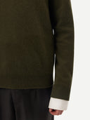 Men's Capulet Olive Crewneck Cashmere worn by model, detail view on white background