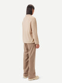 Men's Beige Cashmere Polo Sweater  worn by model, back view on white background