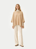 Women's Boat-Neck Cashmere Poncho Beige  worn by model, front view on white background

