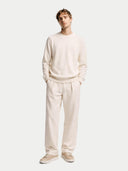 Men's White Cashmere Crew Neck Sweater worn by model front view on white background