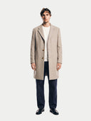 Model wearing the Men's Cashmere Coat with Notched Lapels in Taupe, full-length front view