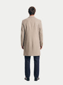 Model wearing the Men's Cashmere Coat with Notched Lapels in Taupe, back view