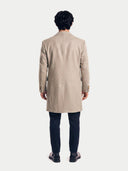 Model wearing the Men's Single-Breasted Cashmere Coat in Taupe, back view