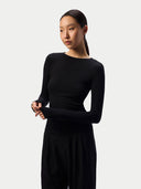 CashmereTech Ultralight Jersey in Black worn by a model, waist-up view