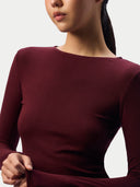 Close-up of the Zinfandel jersey top on a model, showing the slim fit and long sleeves