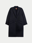 A black wool-blend coat with wide three-quarter sleeves, notched lapels, and two front flap pockets, shown flat against a light gray background. A black wool-blend coat with wide three-quarter sleeves, notched lapels, and two front flap pockets, shown flat against a light gray background.