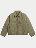 An olive green nylon utility jacket with a zippered front, collar, and two large chest flap pockets, laid flat against a light gray background.