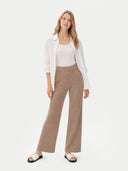 Women's Cashmere Pants Taupe worn by model, front view on white background