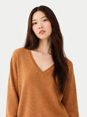 Women's Chipmunk Cashmere V-Neck Sweater worn by model, detail view on white background 