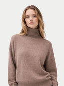 Women's T-Neck Organic Colour Cashmere Sweater Taupe worn by model, detail view on white background