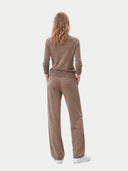 Timeless Cashmere Turtleneck Sweater Taupe worn by model, back view, on white background