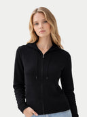 Woman Zipper Hoodie with Smiley Pocket Black worn by model, detail view on white background