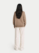 Women's Relaxed-Fit Cashmere Cardigan Taupe  worn by model, back view on white background