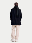 Model wearing the Cashmere Woven Scarf in Black, back view