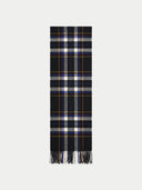 A long plaid scarf with black, white, gray, blue, and yellow stripes, finished with fringe at the bottom, shown flat against a light gray background.