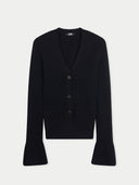 A black long-sleeve cardigan with a V-neck, three-button front closure, and flared cuffs, shown flat against a light gray background. #color_black