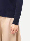 Timeless Cashmere Turtleneck Sweater Navy Blazer  worn by model, detail view, on white background