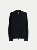A black zip-up knit cashmere sweater with a mock neck and side pockets, displayed flat against a light gray background. #color_black