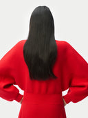 Person wearing a Cashmere Sculptural Dress Fiery Red on a white background 