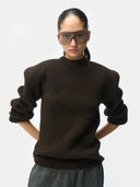 Women’s Mole Sculpted-Shoulder Cashmere Sweaterworn by model, detail view on white background
