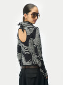 Rope Knot Print Cashmere Silk Sweater Black worn by model, back view, on white background