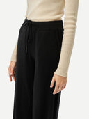 Women's Black Cashmere Straight Leg worn by model, detail view on white background