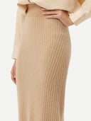 Women's Beige  Cashmere Midi Skirt worn by model, side view on white background