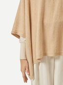 Women's Boat-Neck Cashmere Poncho Beige  worn by model, detail view on white background
