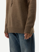 Women's Cashmere Pullover Hoodie Taupe worn by model, detail view on white background