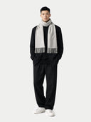 Cashmere Fringed Scarf Dawn Blue worn by model, front view on white background #color_steel-silver