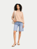 Women's T-Neck Organic Colour Cashmere Sweater Beige worn by model, front view on white background