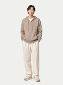 Men's Zip-Up Cashmere Hoodie Taupe worn by model, front view on white background