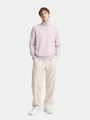 Men's Lavender Fog Cashmere Essential Turtle Neck Sweater worn by model front view,  on white backround