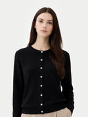 Women's Cashmere Crewneck Cardigan  worn by model, detail view on white background