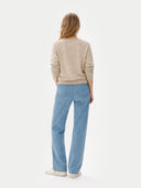Women's Warm Grey V-Neck Sweater  worn by model, back view on white background