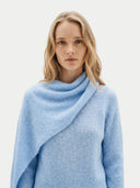 Women's Light Blue Cashmere Sweater with Draped Scarf worn by model, detail view on white background