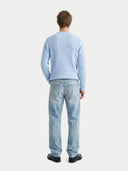 Men's Light Blue Cashmere Cable-Knit Sweater worn by model, back view on white background