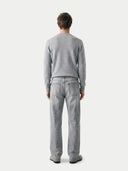 Men's Grey Crewneck Cashmere Sweater worn by model, back view on white background