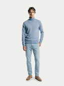 Men's Light Blue Turtleneck Cashmere Sweater worn by model, front view on white background