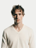 Men's White  V-Neck Cashmere Sweater  worn by model, detail view on white background