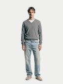 Men's DIm Gray V-Neck Cashmere Sweater worn by model, front view on white background #color_gray