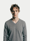 Men's DIm Gray  V-Neck Cashmere Sweater  worn by model, detail view on white background