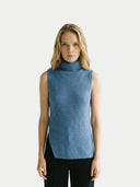 Women's Turtle Neck Cashmere Vest Blue  worn by model, detail view on white backround