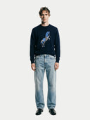 Men's Navy Cashmere Horse Intarsia Sweater worn by model, front view on white background