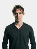 Men's Charcoal V-Neck Cashmere Sweater worn by model, detail view on white background