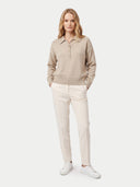 The Cashmere Polo-Collar Sweater in Natural Beige, shown worn.