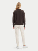 The Cashmere Polo-Collar Sweater in Brown, shown worn.