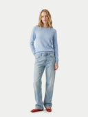 Women's Light Blue Cashmere Crewneck Sweater worn by model, front view on white background