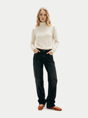 Timeless Cashmere Turtleneck Sweater Off white worn by model, front view, on white background
